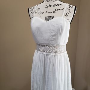 Summer dress with spaghetti straps & netted waste